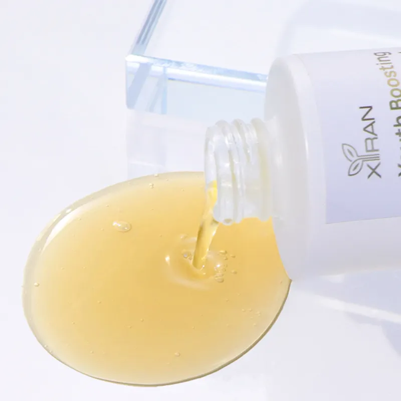 Xiran Youth Boosting Serum being poured from a bottle