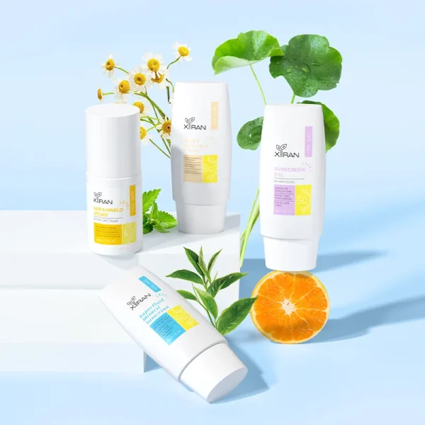 XIRAN sunscreen products displayed with plants and an orange slice on a blue background