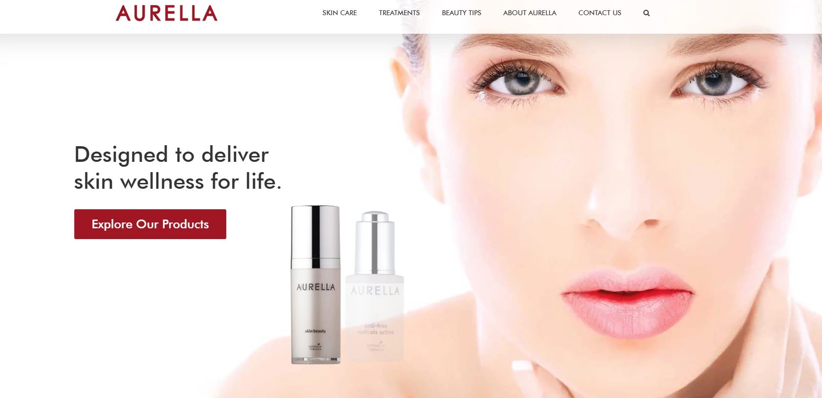 Aurella skincare products with text about delivering skin wellness and a button labeled 'Explore Our Products'.