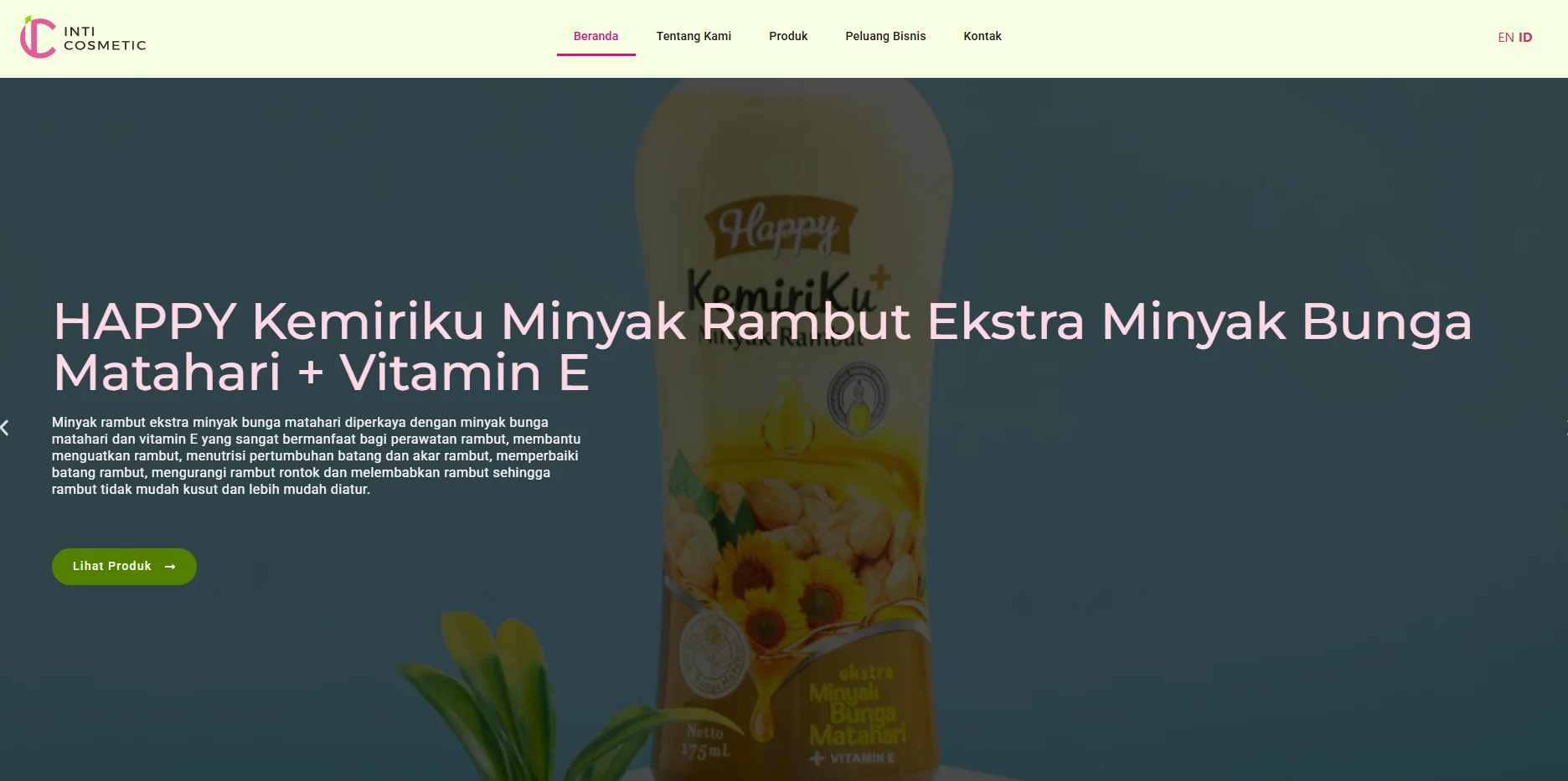 Bottle of Happy Kemiriku hair oil enriched with sunflower oil and vitamin E, placed on a light background.