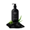 Men Story Hydrating 3-in-1 product featuring black bottle with pump on dark rock and fresh green leaves.