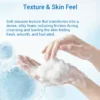 Hands with a soft, foamy cleanser demonstrating its silky texture against a light blue background. Text highlights skincare benefits.