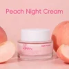 Jar of peach night cream with 70% peach extract and 5% niacinamide, set against a peach-colored background with fresh peaches.