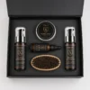 Xiran beard care kit featuring beard balm, oil, shampoo, conditioner, and wooden brush in sleek black packaging.