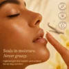Close-up of a woman applying a natural exfoliating product to her lips with her finger. Text highlights benefits like moisture sealing and gentle exfoliation.