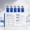Set of five blue copper peptide serum vials with packaging displaying product details, benefits, and usage instructions.