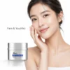 A woman with radiant skin gently touching her cheek, showcasing a skincare cream labeled 'Volufiline Super A Peptide Wrinkle-Reducing Cream' with the caption 'Firm & Youthful'.