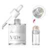 NAD+ mitochondrial peptide microneedling serum displayed with a dropper and a microneedling applicator featuring fine needles.